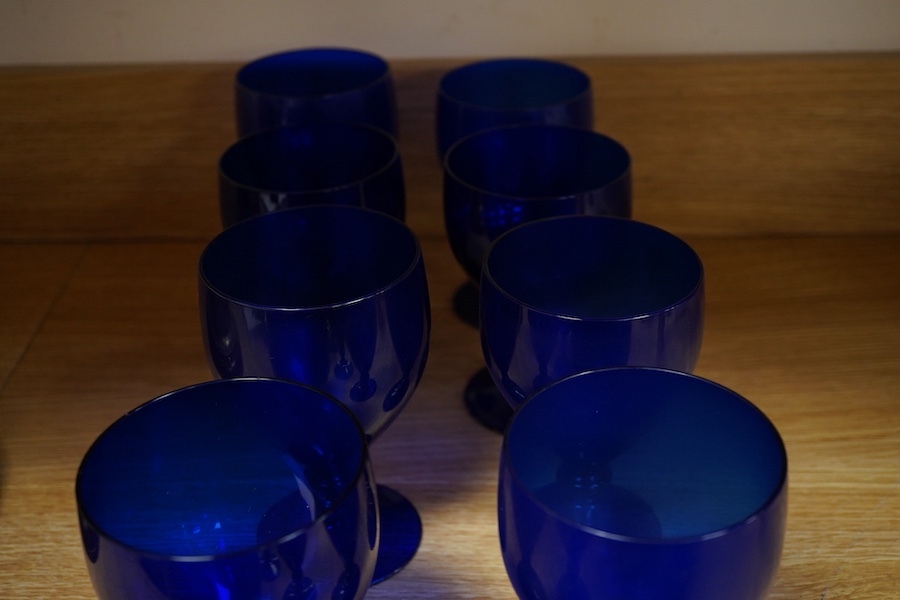 A collection of fourteen Bristol blue glass rummers, largest 15cm high